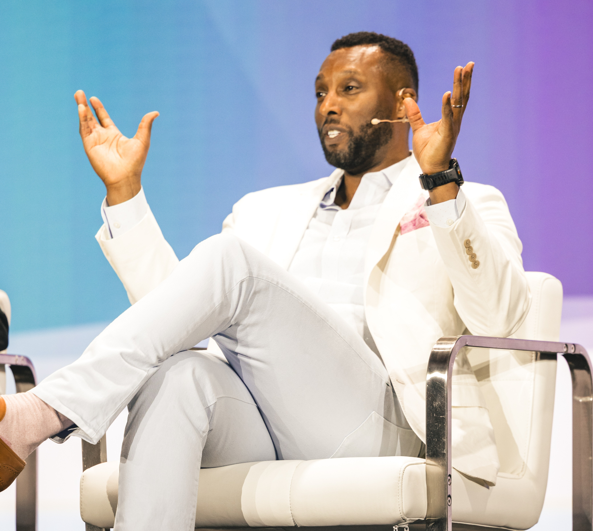 Ronnell Richards on stage delivering a keynote